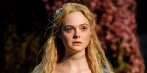 Effie's Back! Fanning Teases Hunger Games Prequel Progress